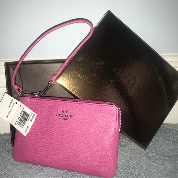 Coach Handbags - BRAND NEW COACH WRISTLET ACCEPTING OFFERS‼️